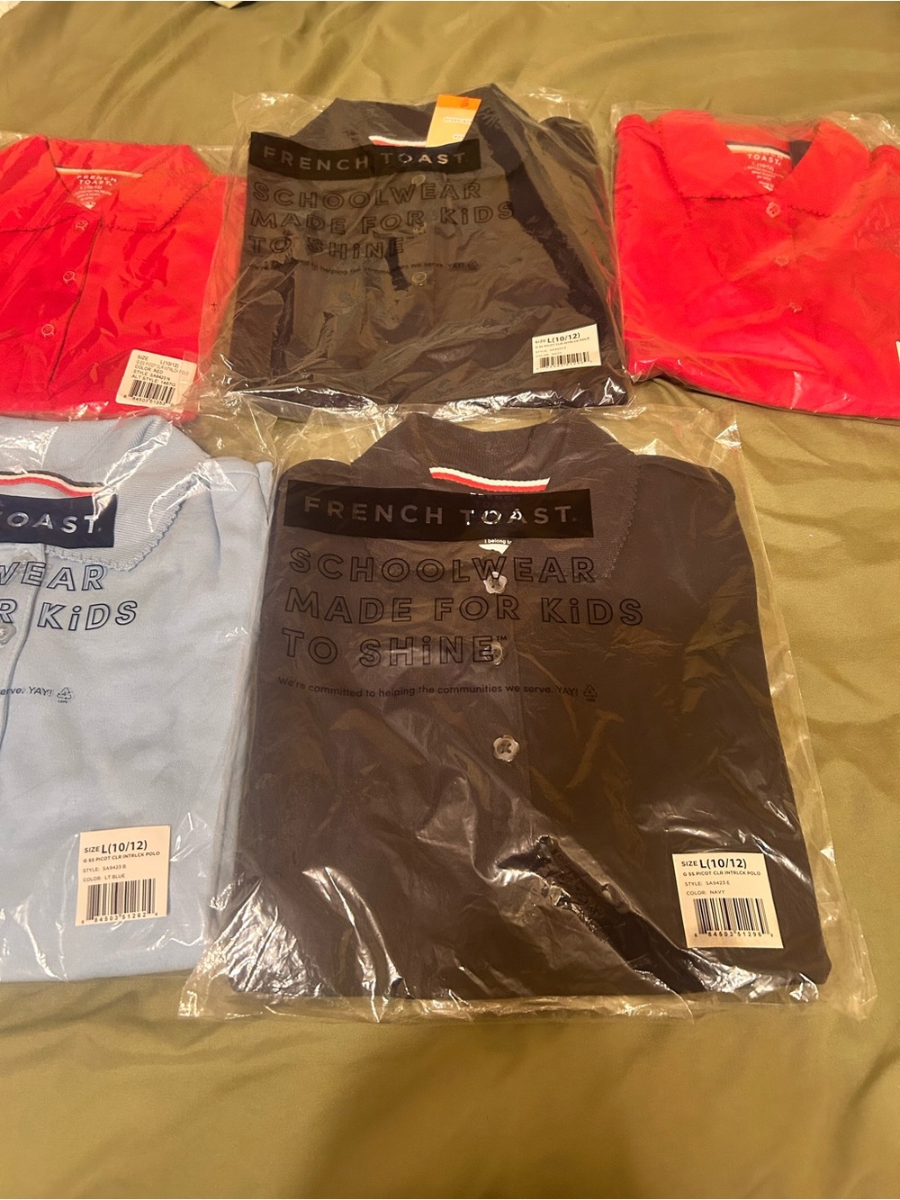 Five school uniform polos